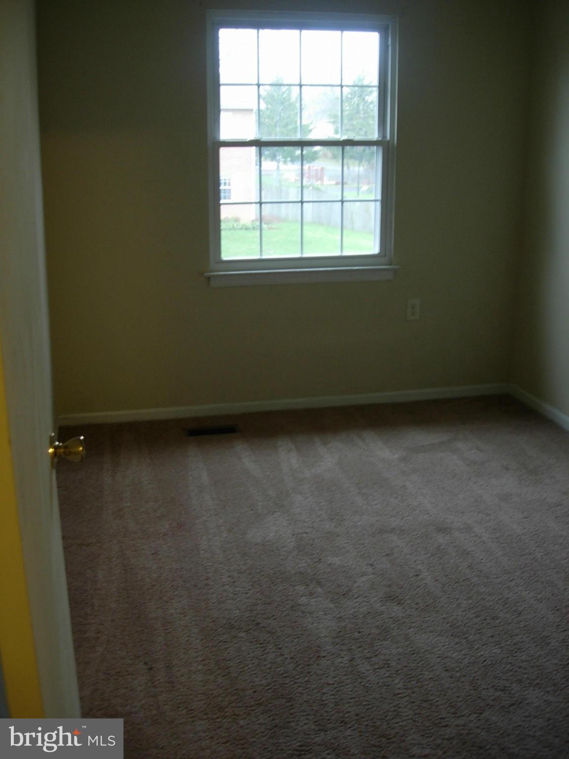 205 Ritter Place Berryville, VA 22611 - Photo 22 of 29 an empty room with a window