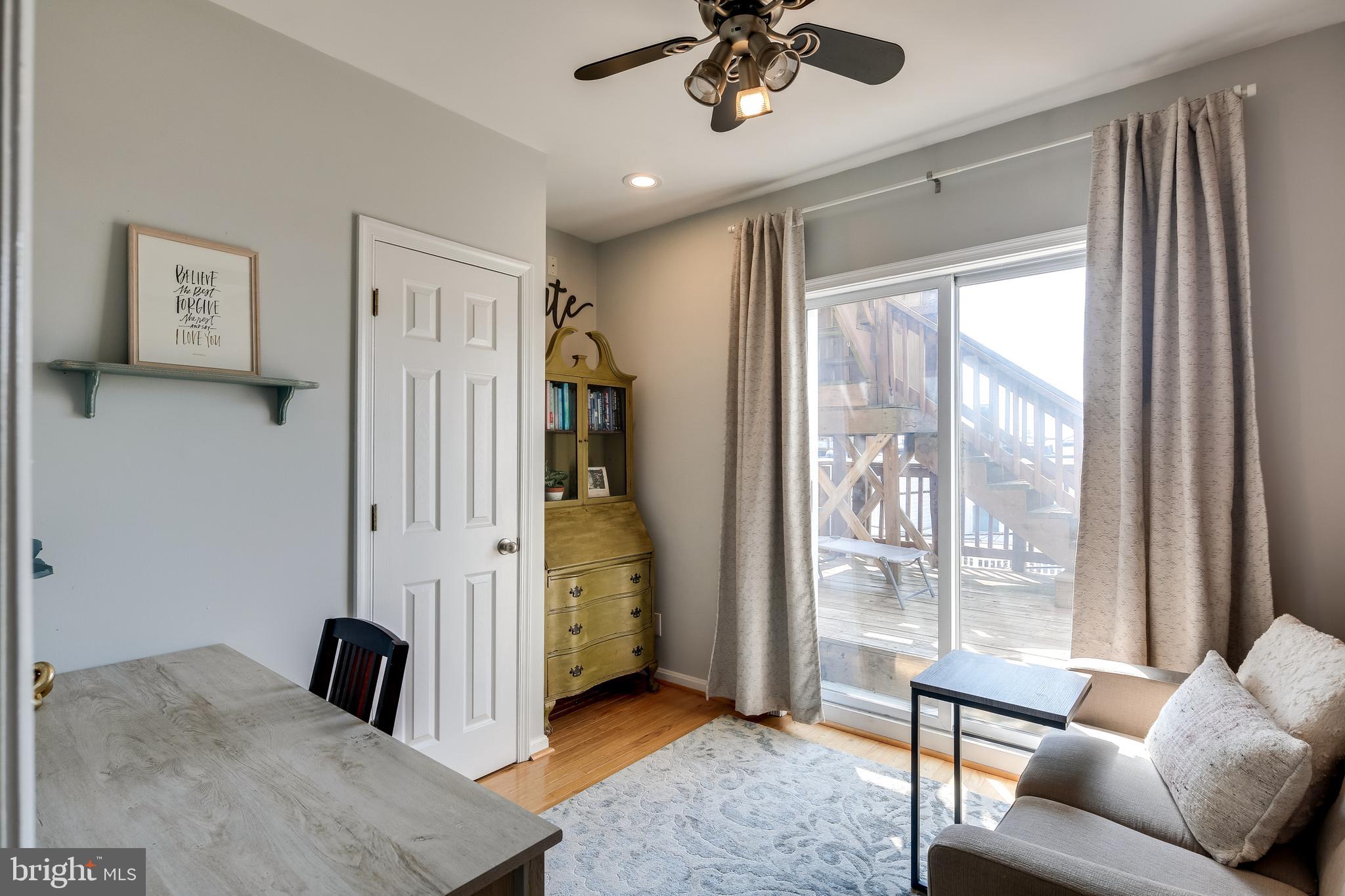 728 South Curley Street Baltimore, MD 21224 - Photo 18 of 29 Bedroom 2 with Deck Access