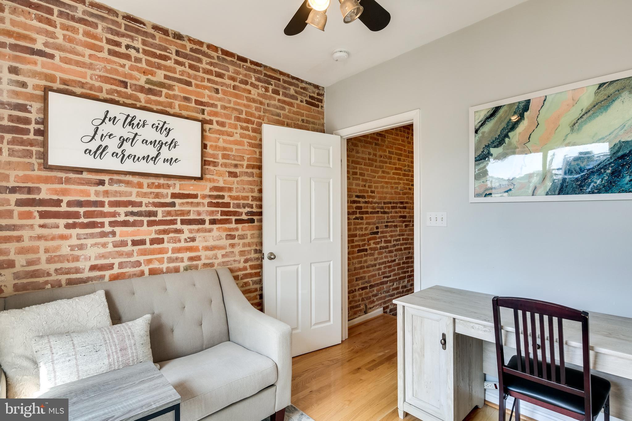 728 South Curley Street Baltimore, MD 21224 - Photo 19 of 29 Bedroom 2 with Exposed Brick