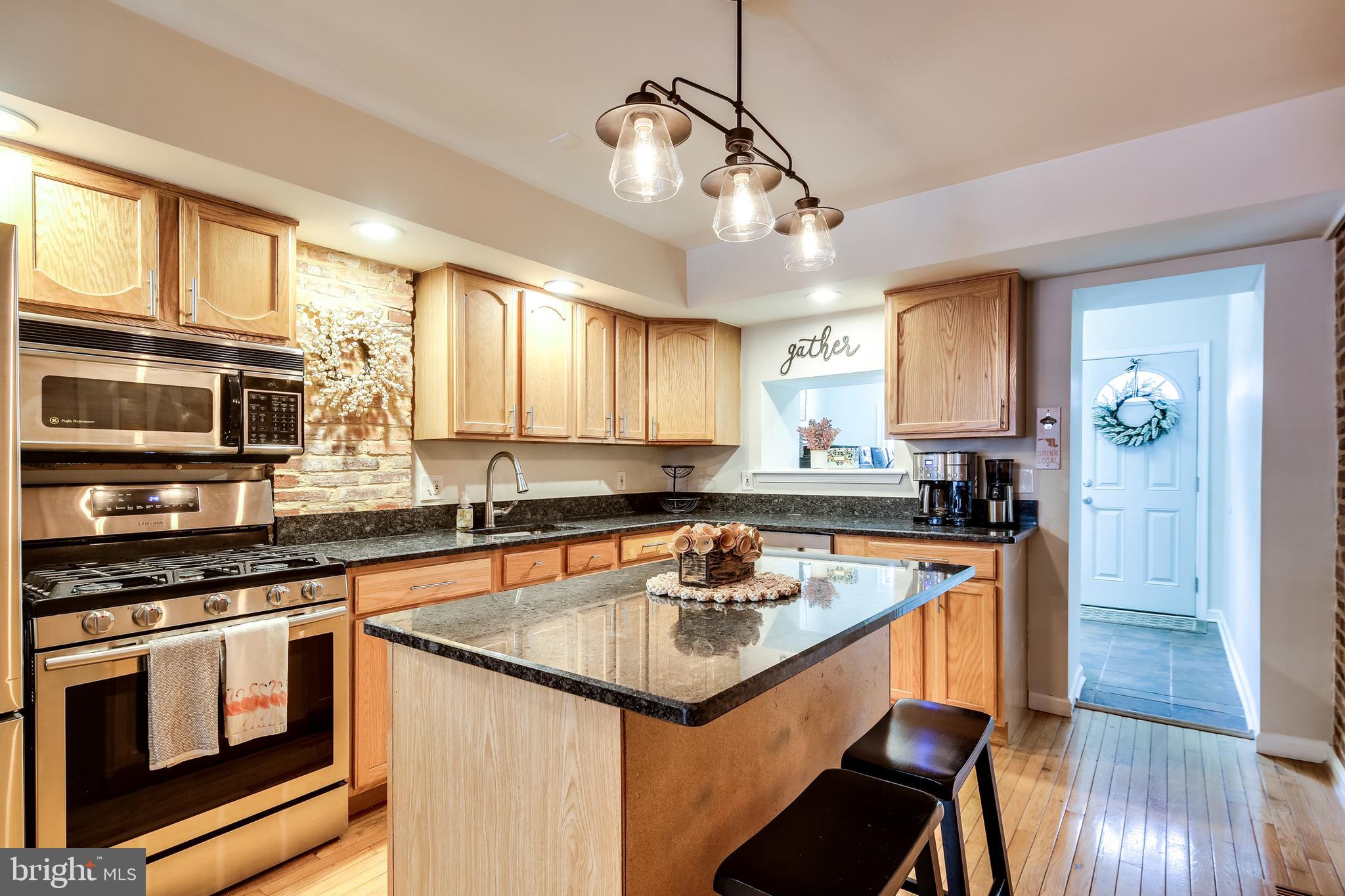 728 South Curley Street Baltimore, MD 21224 - Photo 8 of 29 Gourmet Kitchen w/ island