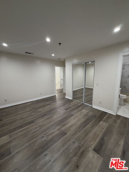 121 South Rampart Boulevard, Unit 3 Los Angeles, CA 90057 - Photo 17 of 20 an empty room with wooden floor