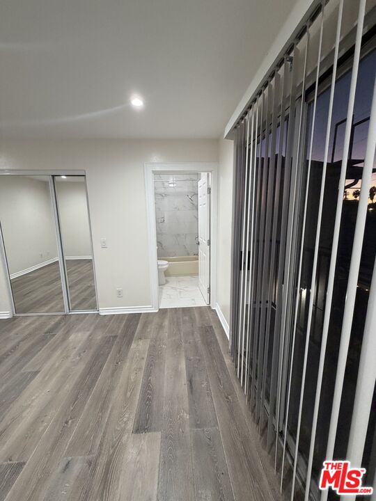 121 South Rampart Boulevard, Unit 3 Los Angeles, CA 90057 - Photo 18 of 20 a view of empty room with wooden floor