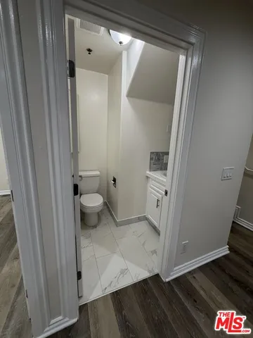 a bathroom with a sink and a toilet