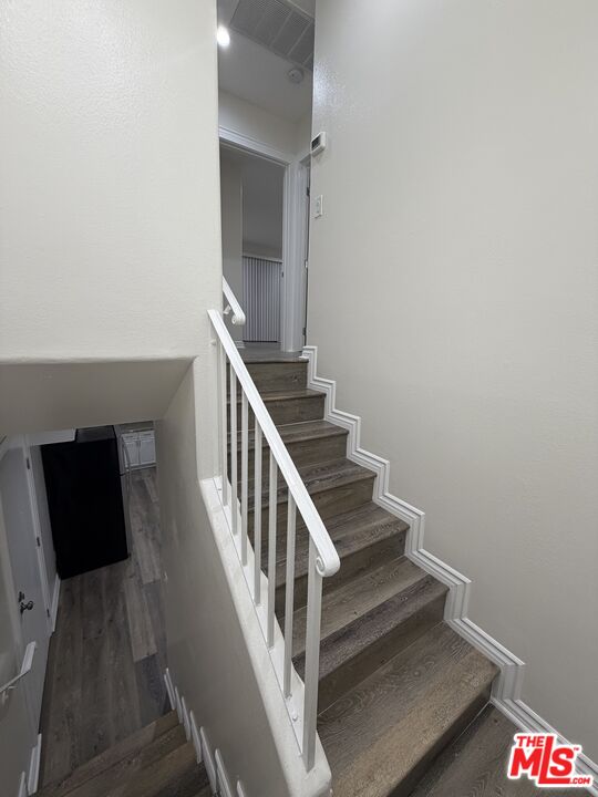 121 South Rampart Boulevard, Unit 3 Los Angeles, CA 90057 - Photo 9 of 20 a view of entryway and hall with wooden floor