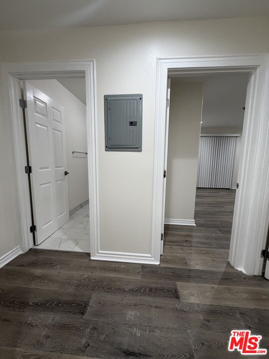 121 South Rampart Boulevard, Unit 3 Los Angeles, CA 90057 - Photo 10 of 20 a view of a hallway with wooden floor and cabinet