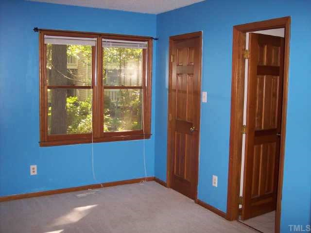 707 Benchmark Drive Raleigh, NC 27615 - Photo 10 of 10 Back Bedroom with walk-in closet and full bath Other