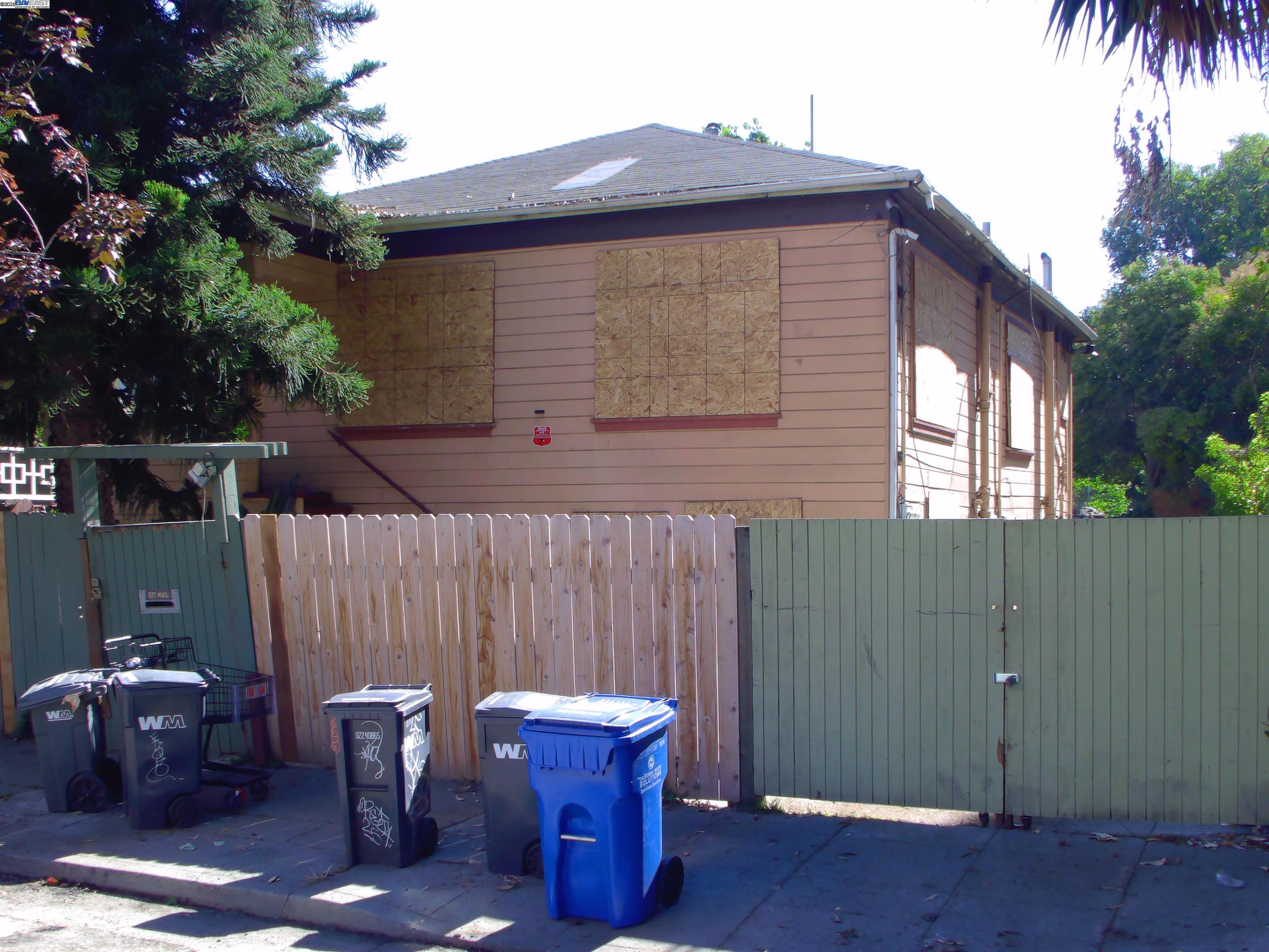 577 48th Street Oakland, CA 94609 - Photo 1 of 11 a backyard of a house with outdoor seating