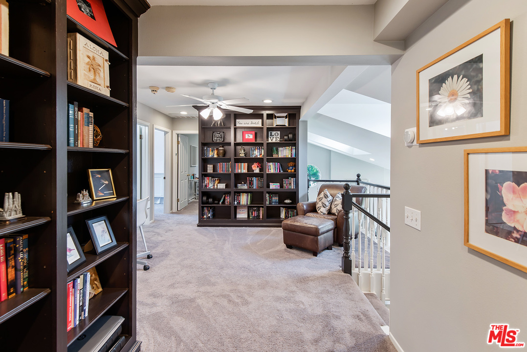 26021 Farmfield Road Calabasas, CA 91302 - Photo 30 of 50 walk in living room with furniture and book shelf