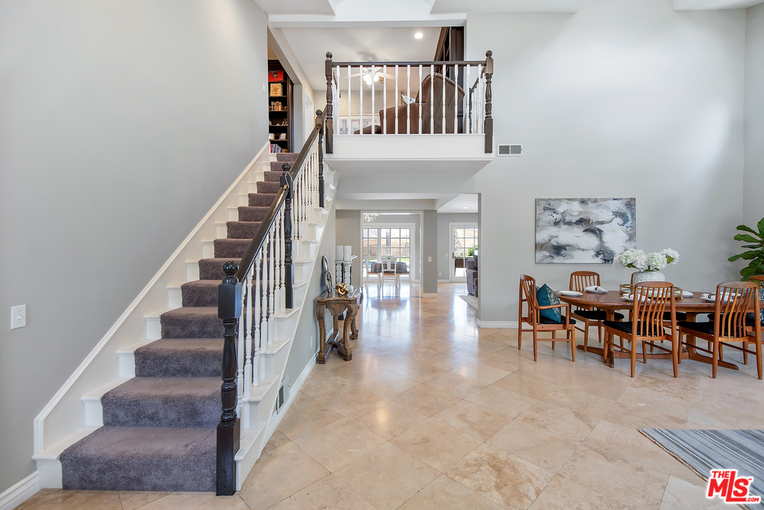 26021 Farmfield Road Calabasas, CA 91302 - Photo 4 of 50 a view of a livingroom with furniture and stairs