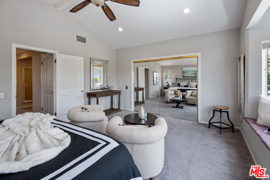 26021 Farmfield Road Calabasas, CA 91302 - Photo 33 of 50 a living room with furniture and a large window