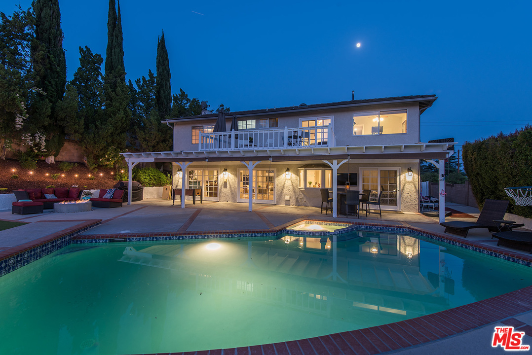 26021 Farmfield Road Calabasas, CA 91302 - Photo 49 of 50 a view of a swimming pool with outdoor seating