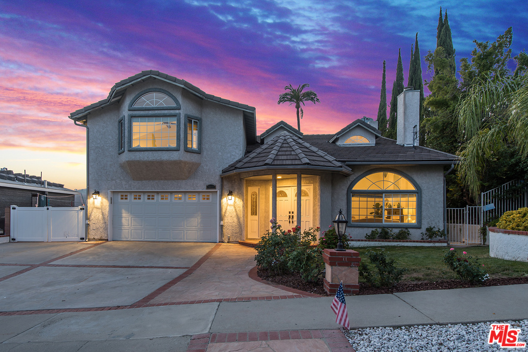 26021 Farmfield Road Calabasas, CA 91302 - Photo 50 of 50 a front view of a house with a yard