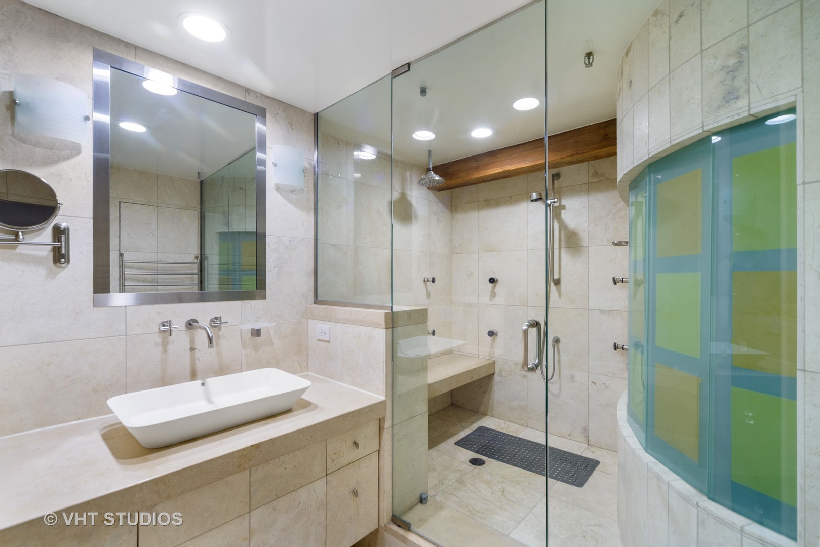1000 West Washington Boulevard, Unit 438 Chicago, IL 60607 - Photo 12 of 23 a bathroom with a double vanity sink a large mirror and shower