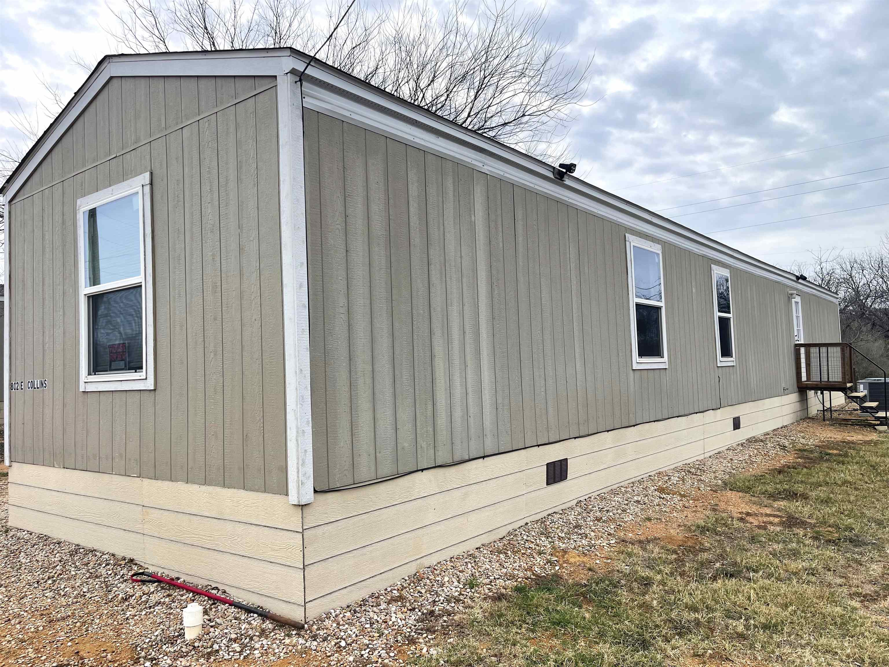 802 East Collins Street Llano, TX 78643 - Photo 2 of 14 a backyard of a house