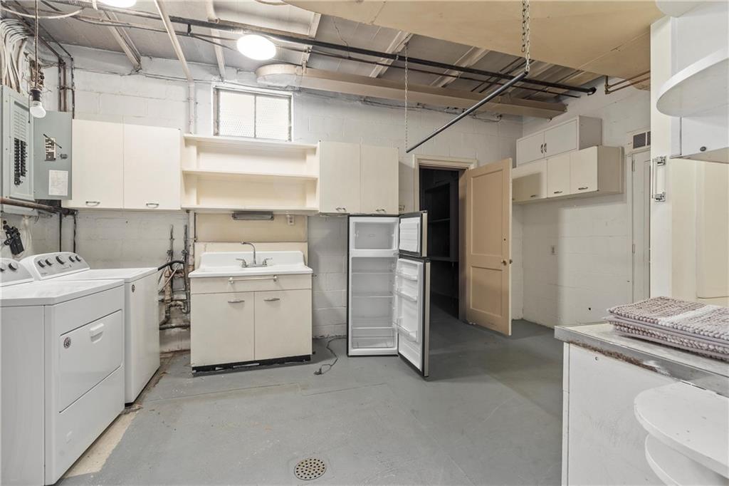 100 Circle Drive Pittsburgh, PA 15237 - Photo 23 of 31 a utility room with cabinets washer and dryer