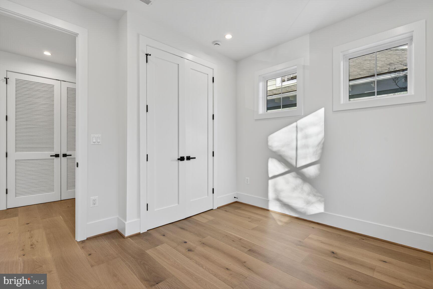 1209 Decatur Street Northwest Washington, DC 20011 - Photo 20 of 54 a view of empty room with wooden floor
