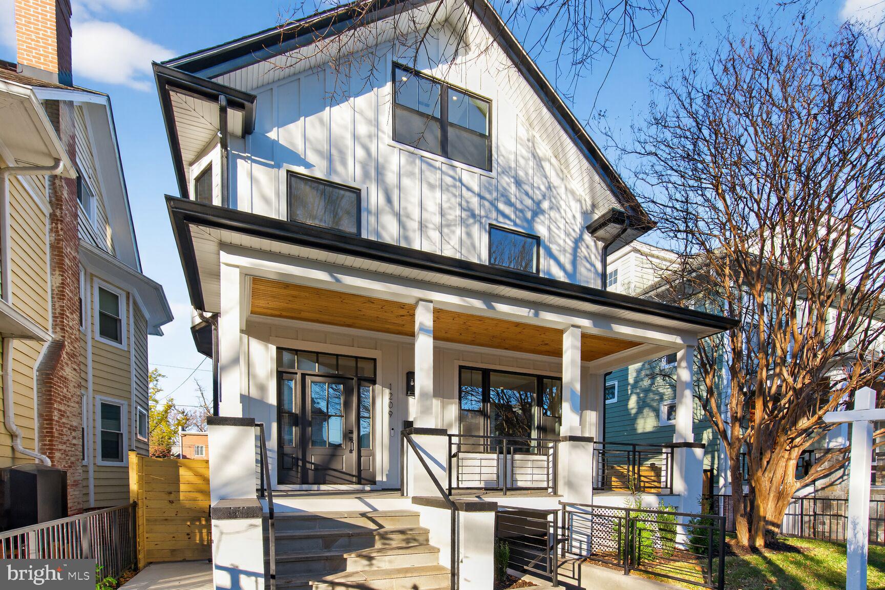 1209 Decatur Street Northwest Washington, DC 20011 - Photo 2 of 54 a view of a building with a large windows