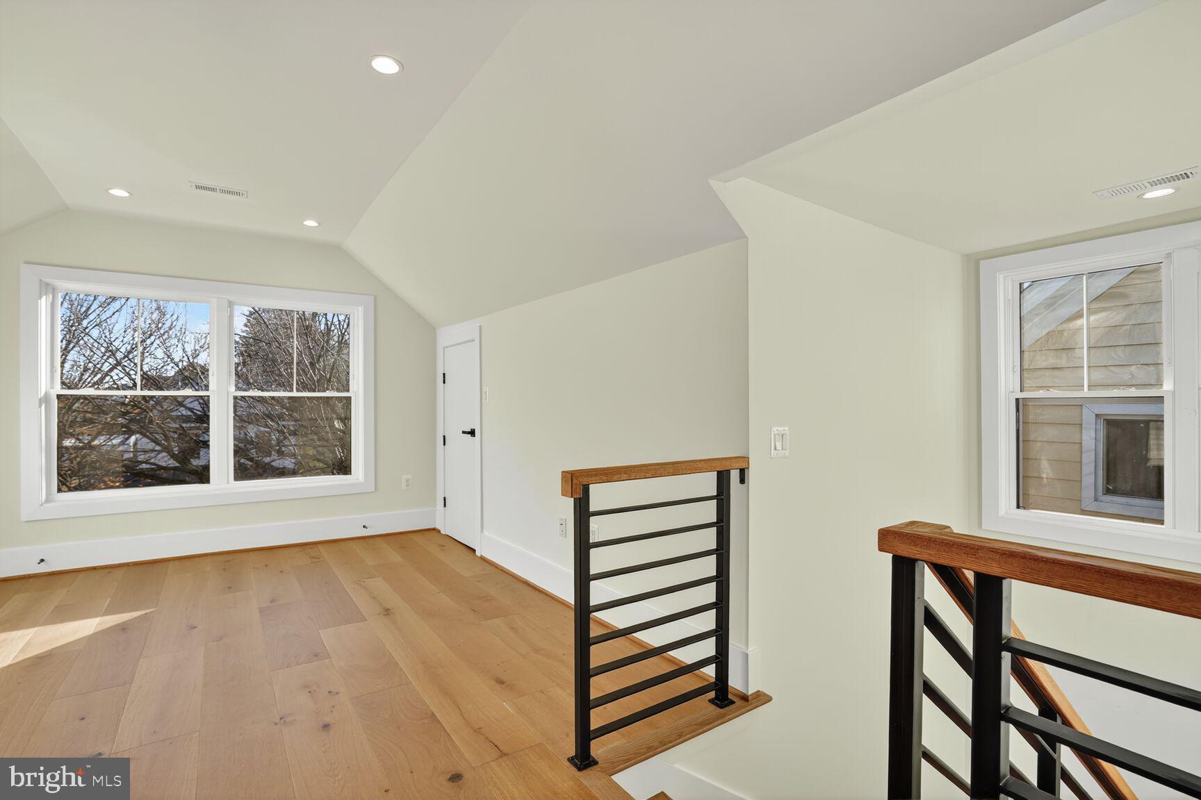 1209 Decatur Street Northwest Washington, DC 20011 - Photo 33 of 54 a view of wooden floor and windows in a room