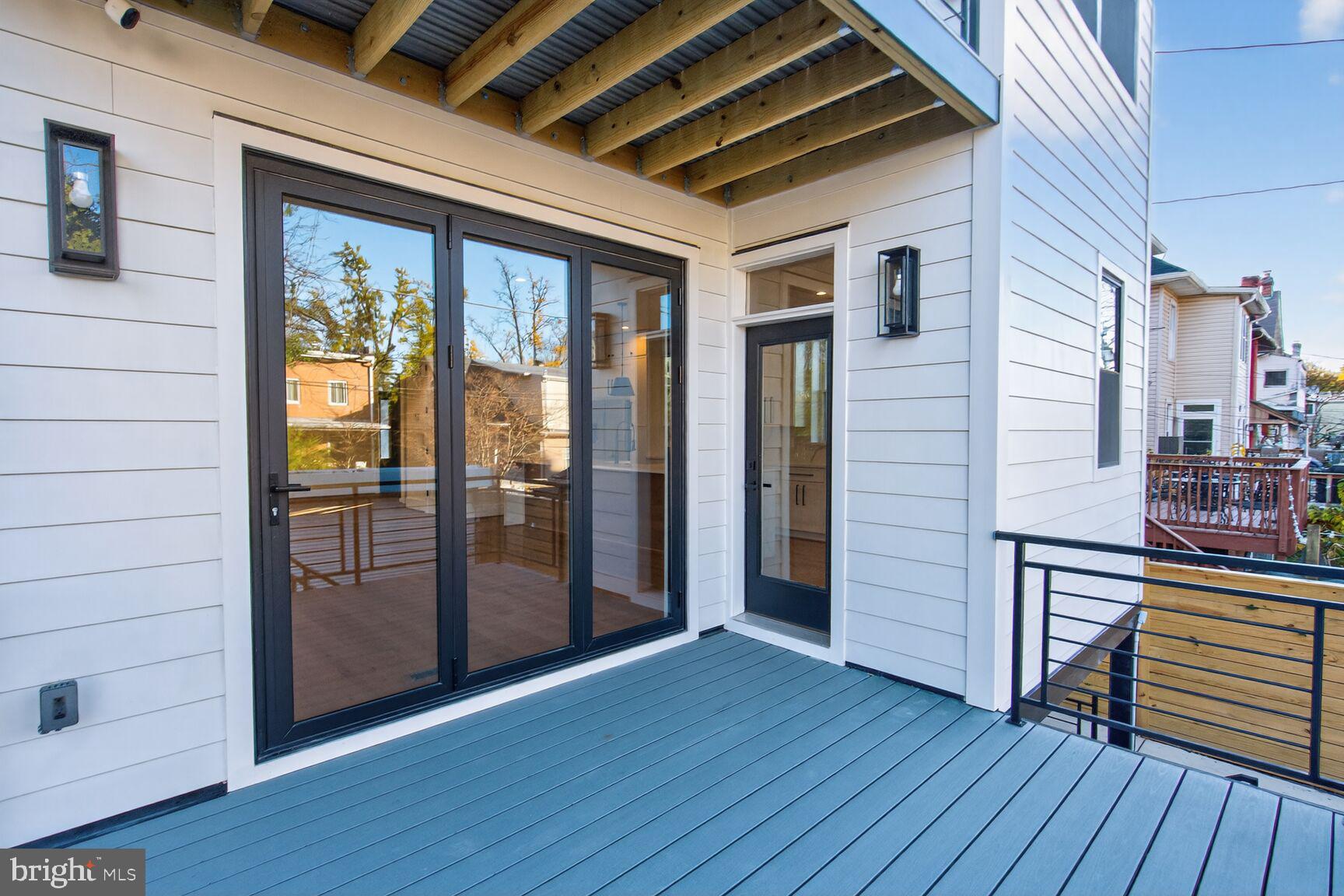 1209 Decatur Street Northwest Washington, DC 20011 - Photo 48 of 54 a view of a hallway with wooden floor