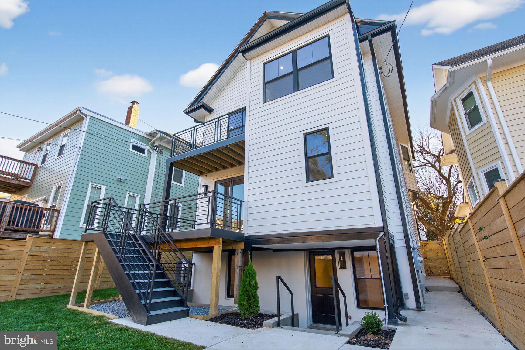 1209 Decatur Street Northwest Washington, DC 20011 - Photo 5 of 54 a front view of a house with stairway