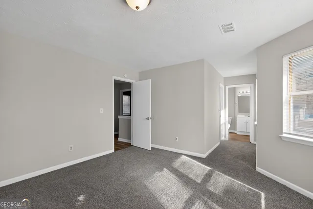 a view of an empty room with window