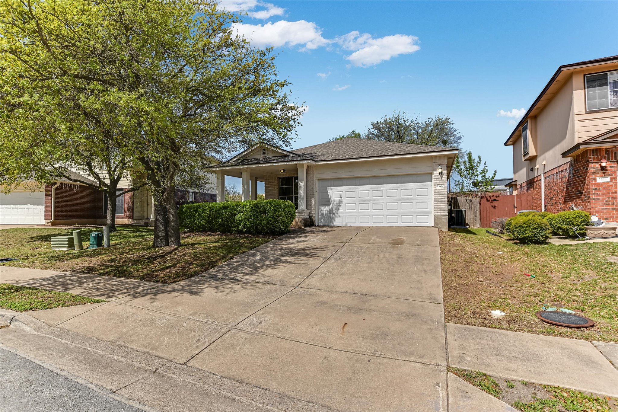 1520 Miss Allison's Way Pflugerville, TX 78660 - Photo 2 of 20 a front view of a house with garden