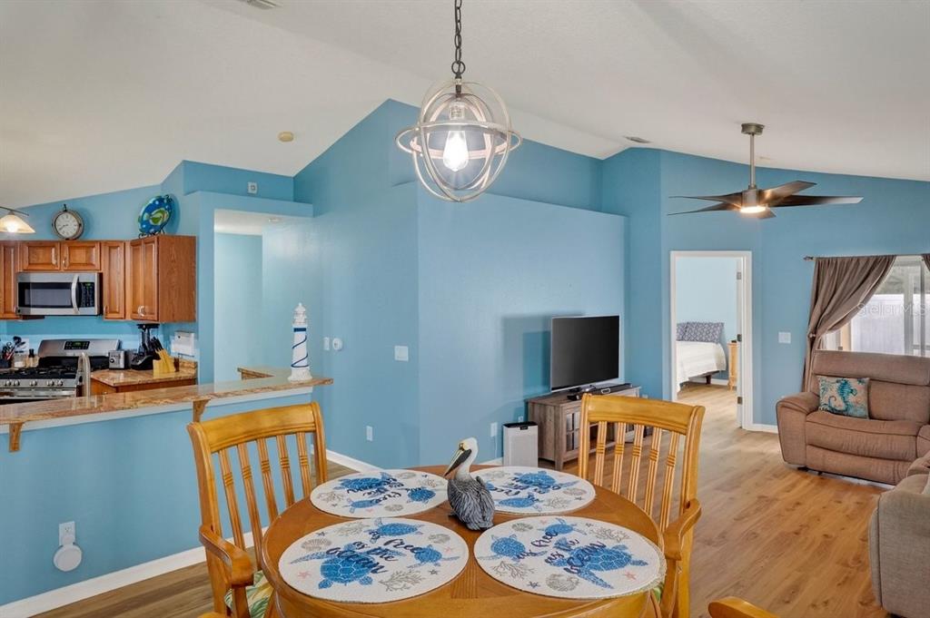630 Fawn Ridge Drive Orange City, FL 32763 - Photo 20 of 55 a view of a dining room with furniture