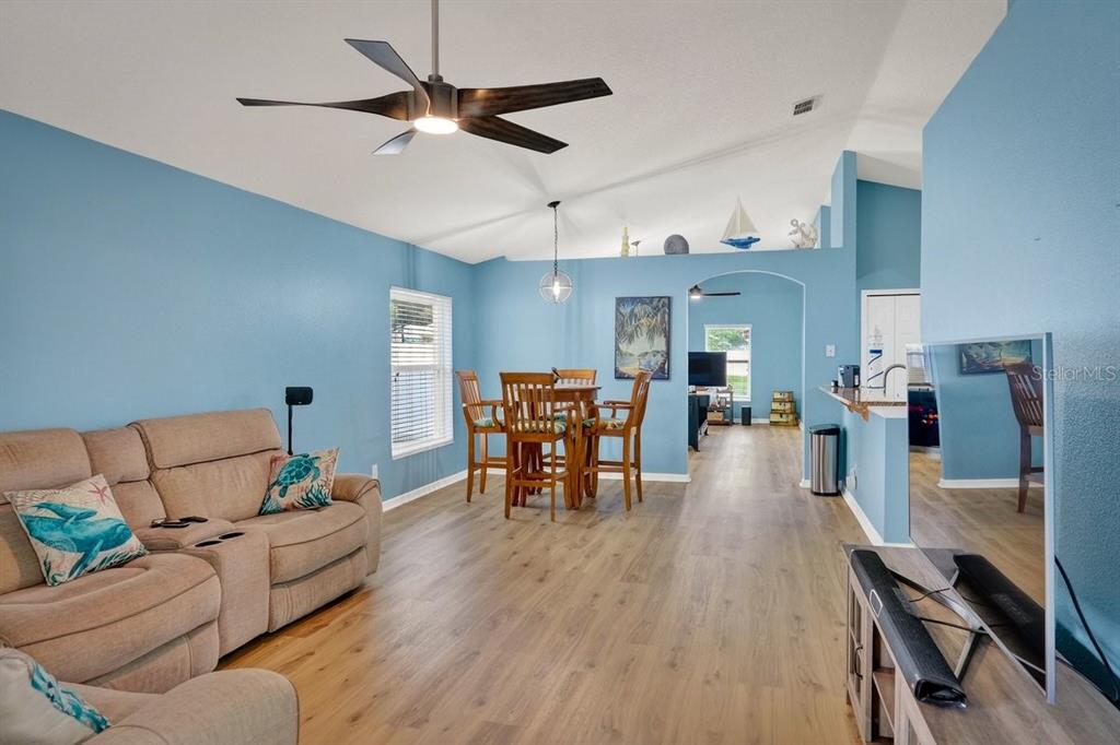 630 Fawn Ridge Drive Orange City, FL 32763 - Photo 21 of 55 a living room with furniture and wooden floor