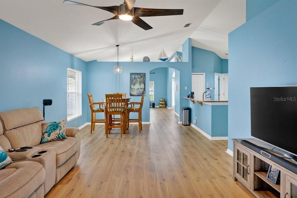 630 Fawn Ridge Drive Orange City, FL 32763 - Photo 22 of 55 a living room with furniture and a flat screen tv