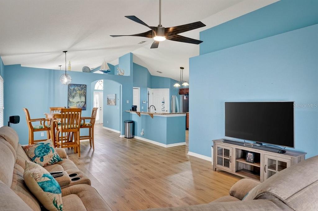 630 Fawn Ridge Drive Orange City, FL 32763 - Photo 23 of 55 a living room with furniture and a flat screen tv