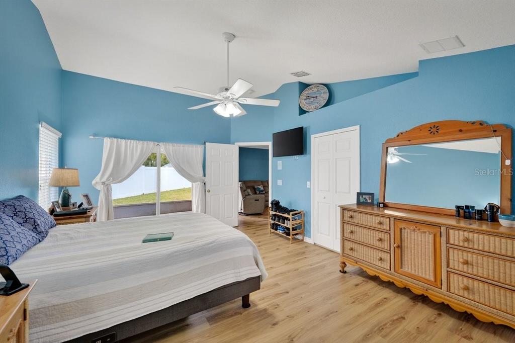 630 Fawn Ridge Drive Orange City, FL 32763 - Photo 26 of 55 a bed room with a bed and a dresser