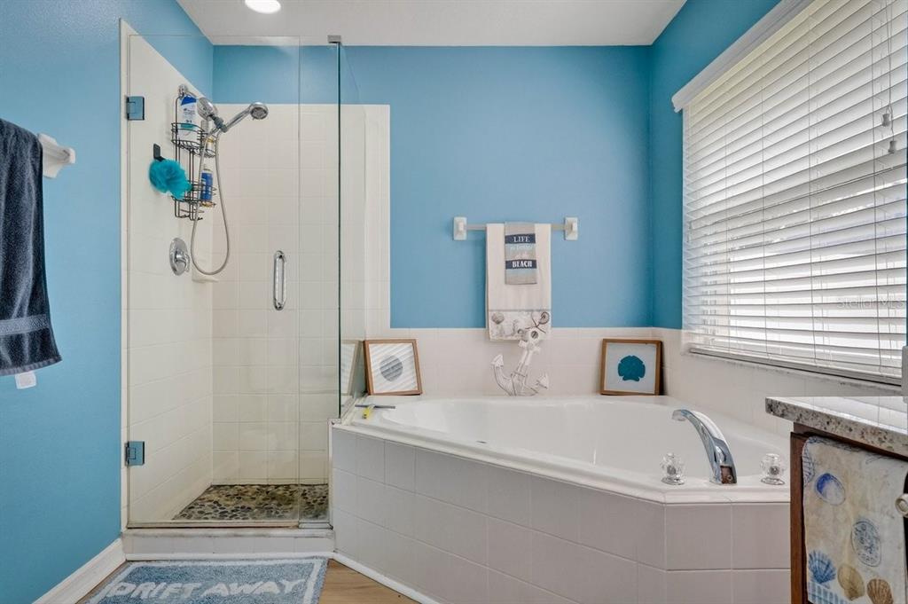 630 Fawn Ridge Drive Orange City, FL 32763 - Photo 31 of 55 a bathroom with a bathtub and a shower