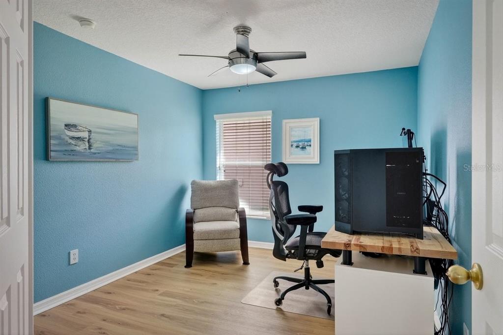 630 Fawn Ridge Drive Orange City, FL 32763 - Photo 33 of 55 a view of a workspace with furniture and a window