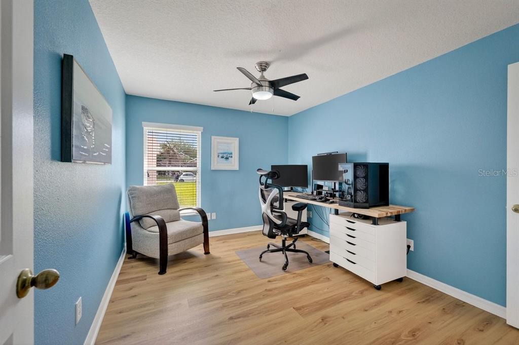 630 Fawn Ridge Drive Orange City, FL 32763 - Photo 34 of 55 a view of a workspace with furniture and a window