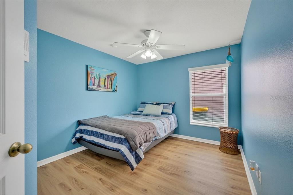630 Fawn Ridge Drive Orange City, FL 32763 - Photo 36 of 55 a bedroom with a bed and a window