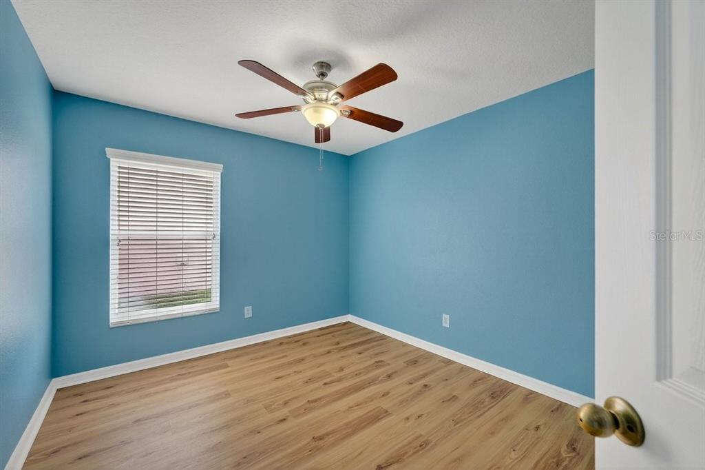 630 Fawn Ridge Drive Orange City, FL 32763 - Photo 39 of 55 a view of a room with wooden floor closet and ceiling fan