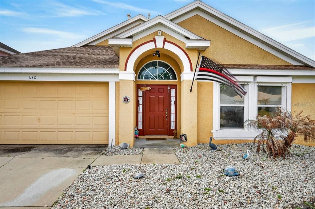 630 Fawn Ridge Drive Orange City, FL 32763 - Photo 4 of 55 a view of entrance gate of the house