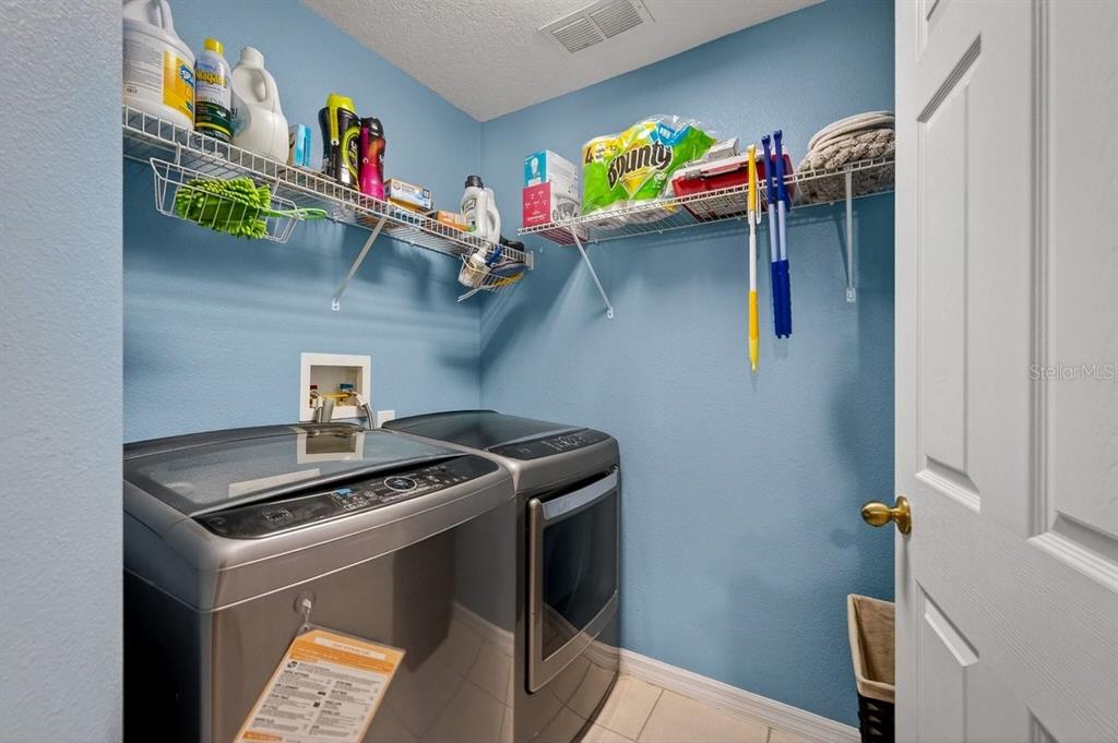 630 Fawn Ridge Drive Orange City, FL 32763 - Photo 41 of 55 a room with storage and utility