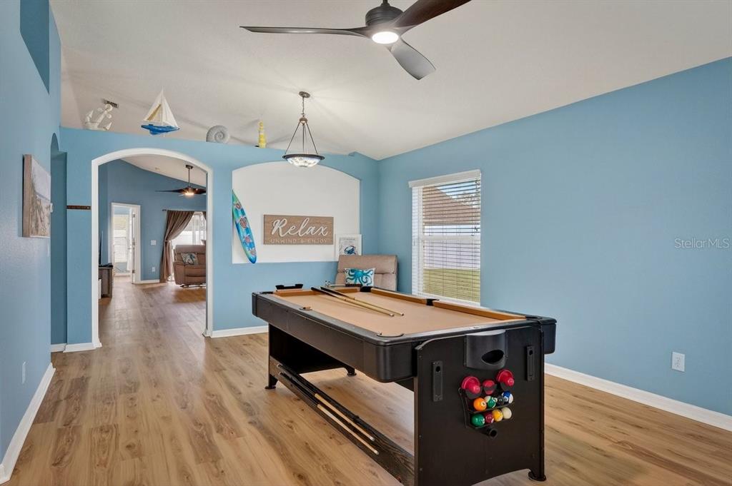 630 Fawn Ridge Drive Orange City, FL 32763 - Photo 7 of 55 a room with a bed and a table