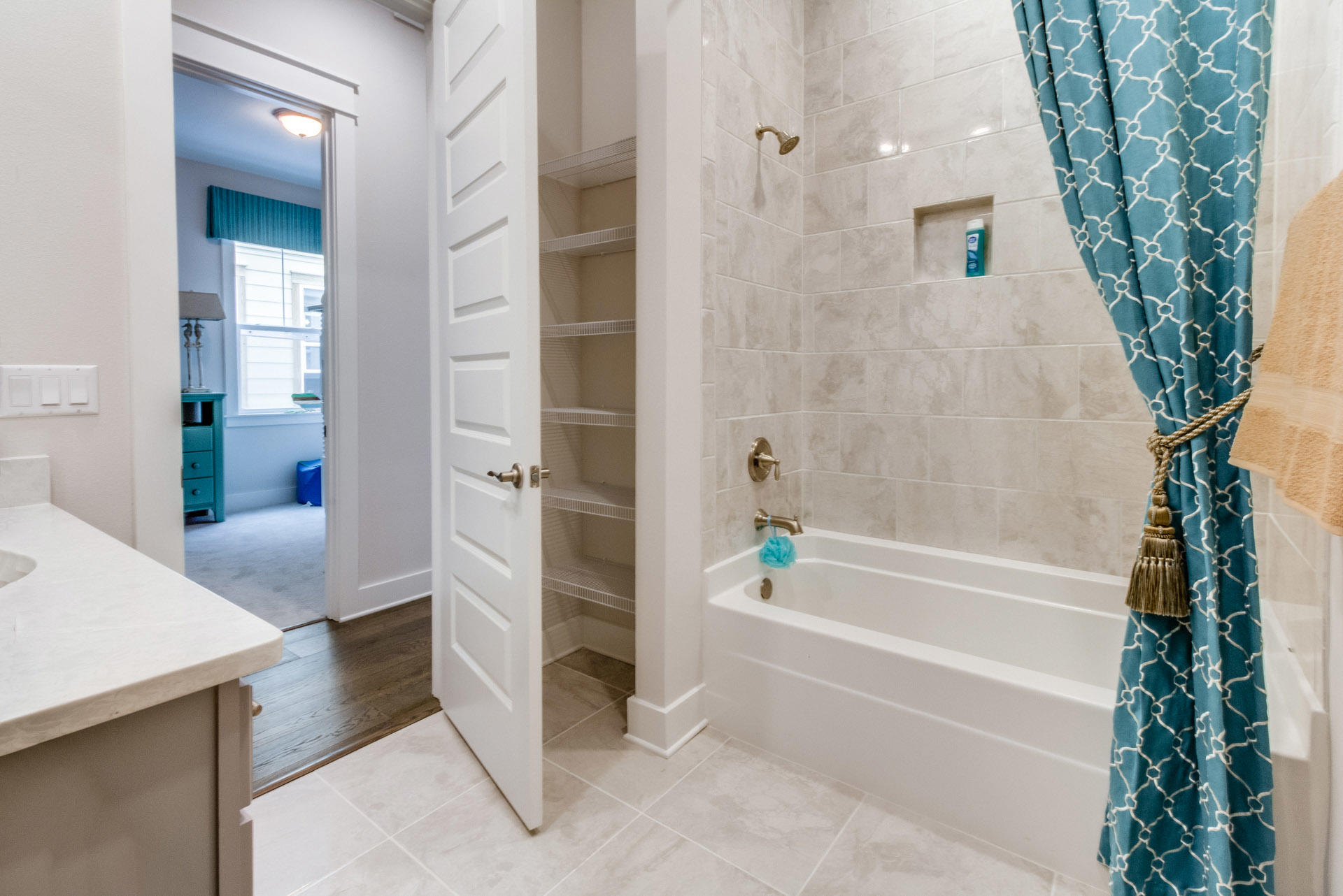 89 East Pine Lands Loop, Unit A Inlet Beach, FL 32461 - Photo 11 of 40 a bathroom with a bathtub and a shower