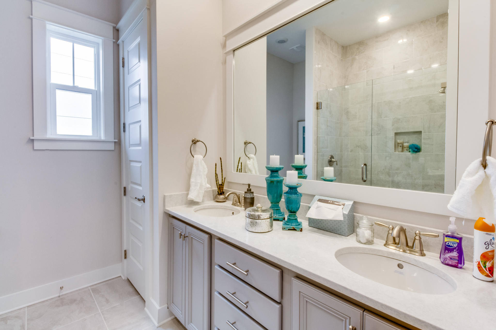 89 East Pine Lands Loop, Unit A Inlet Beach, FL 32461 - Photo 13 of 40 a bathroom with double vanity sink a mirror and a shower