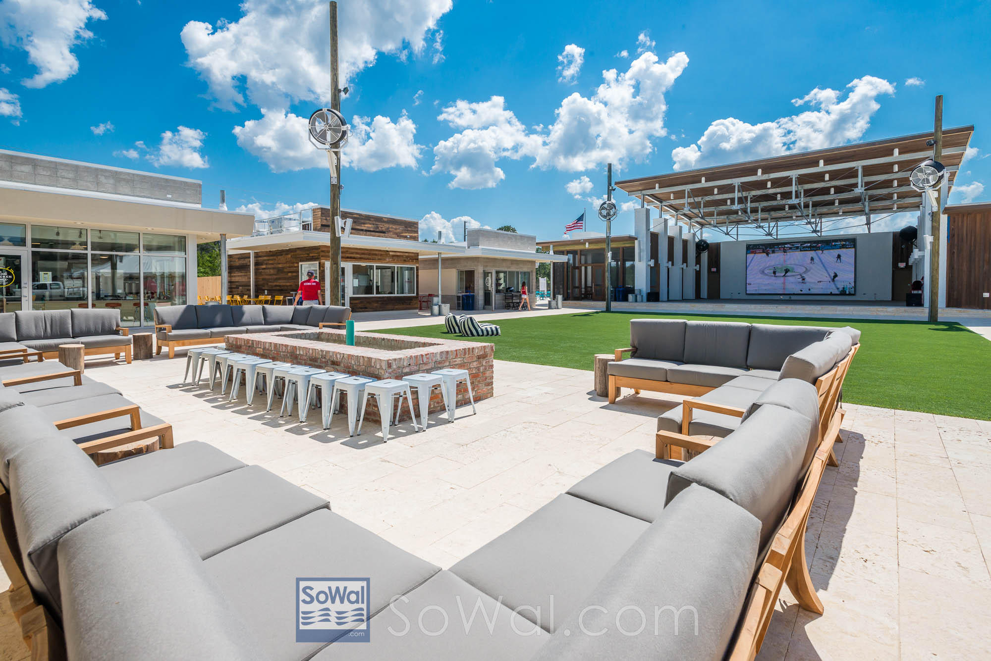 89 East Pine Lands Loop, Unit A Inlet Beach, FL 32461 - Photo 22 of 40 a view of a house with swimming pool having outdoor seating