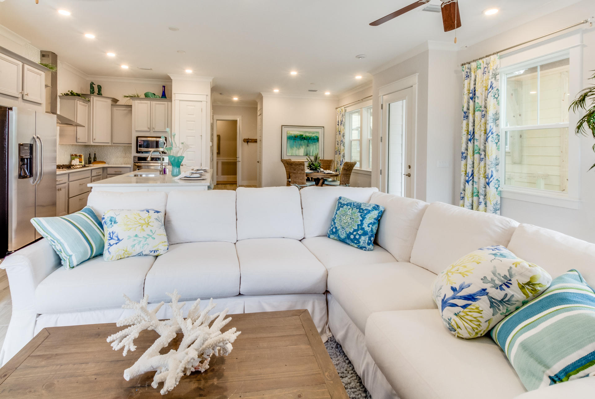 89 East Pine Lands Loop, Unit A Inlet Beach, FL 32461 - Photo 7 of 40 a living room with furniture and kitchen view