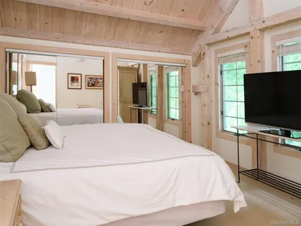 a bath tub sitting next to a shower