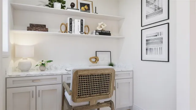 a bedroom with a bed and cabinets