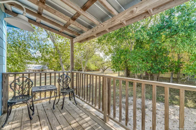 a view of a two chairs in the deck