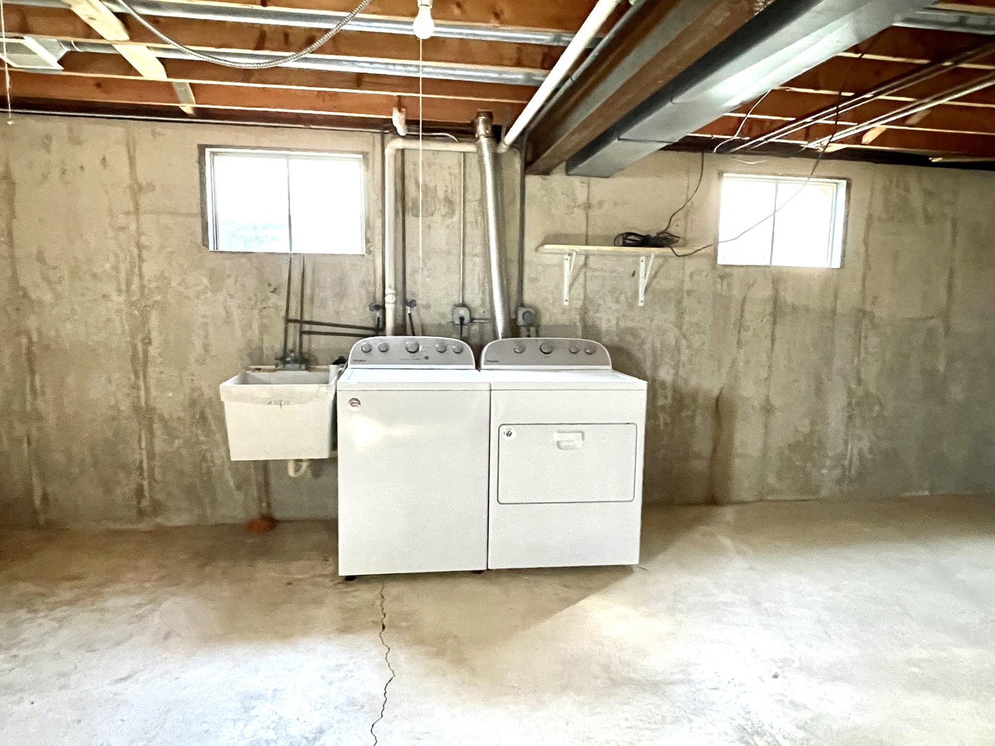1277 Getzelman Drive Elgin, IL 60123 - Photo 16 of 20 a utility room with dryer and washer