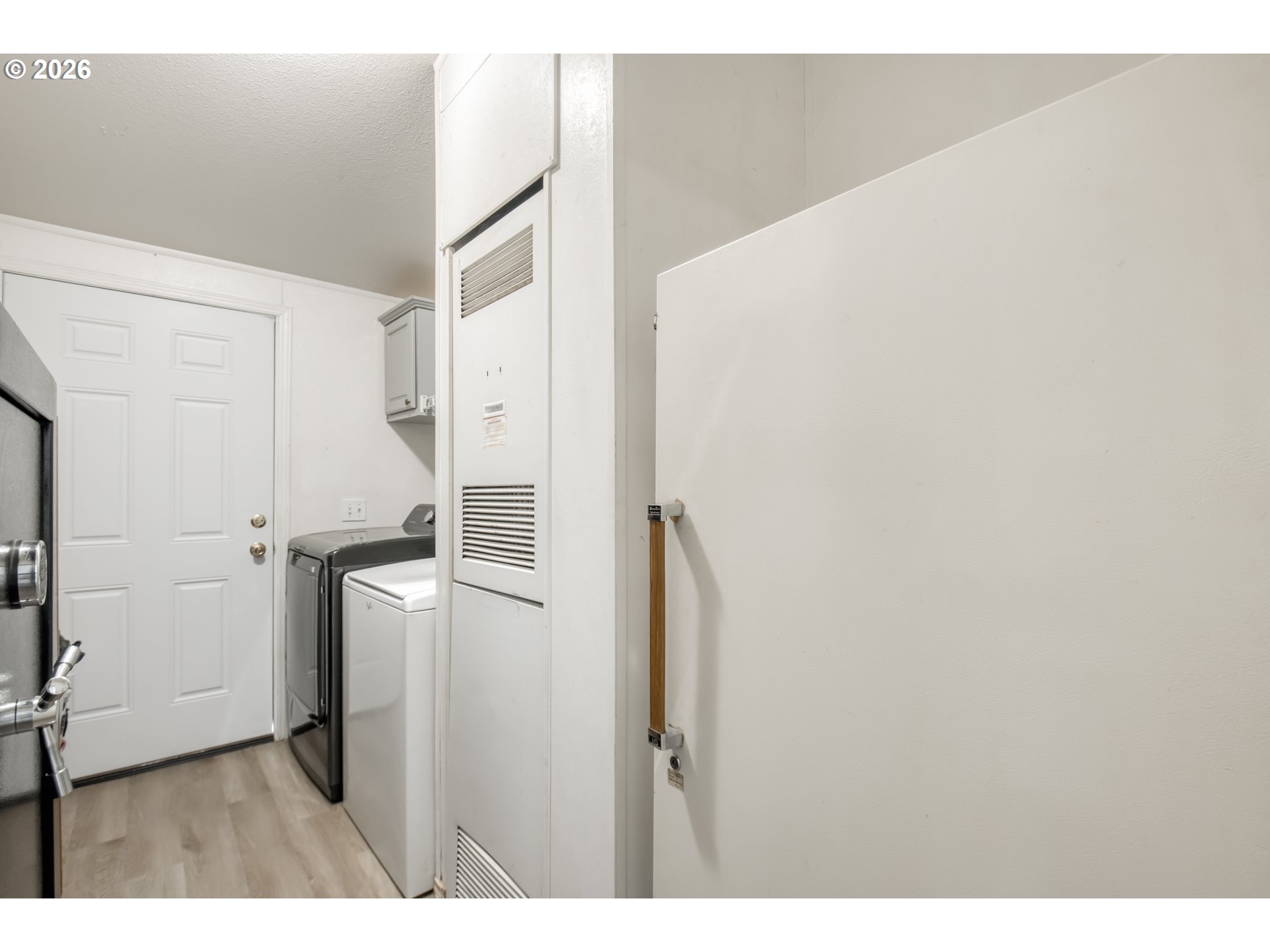 513 Rose Avenue Vernonia, OR 97064 - Photo 17 of 19 a kitchen with refrigerator and cabinets