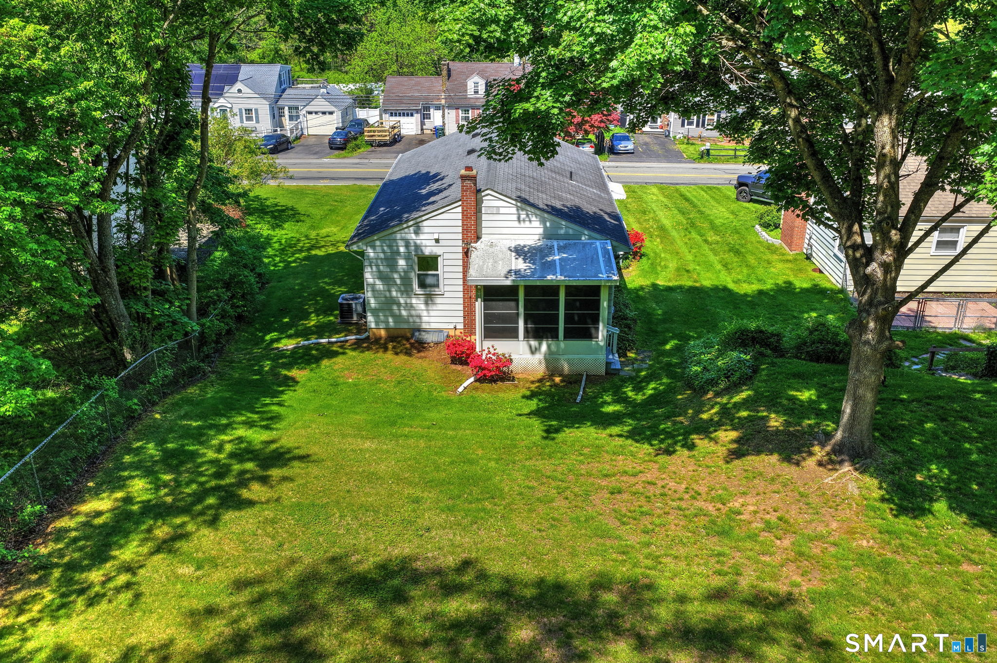 212 Swain Avenue Meriden, CT 06450 - Photo 11 of 38 a view of a house with a big yard plants and large trees