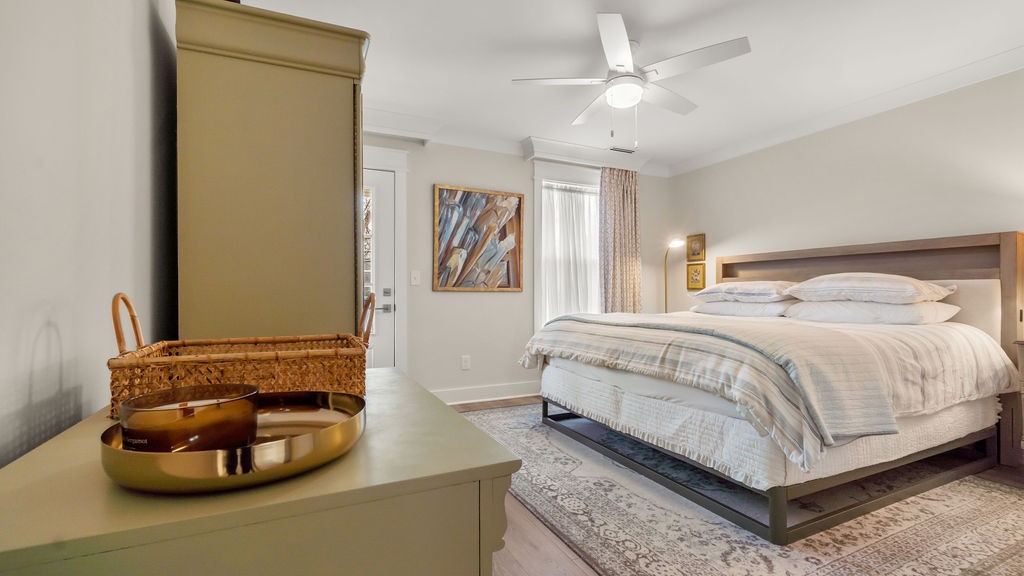 819 North Maple Street Murfreesboro, TN 37130 - Photo 27 of 64 a bedroom with a bed and a chandelier